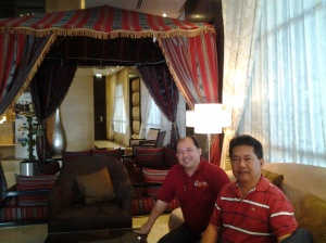 Me and Fr. Estong in Grand Belle Vue Hotel lobby-Dubai checking out